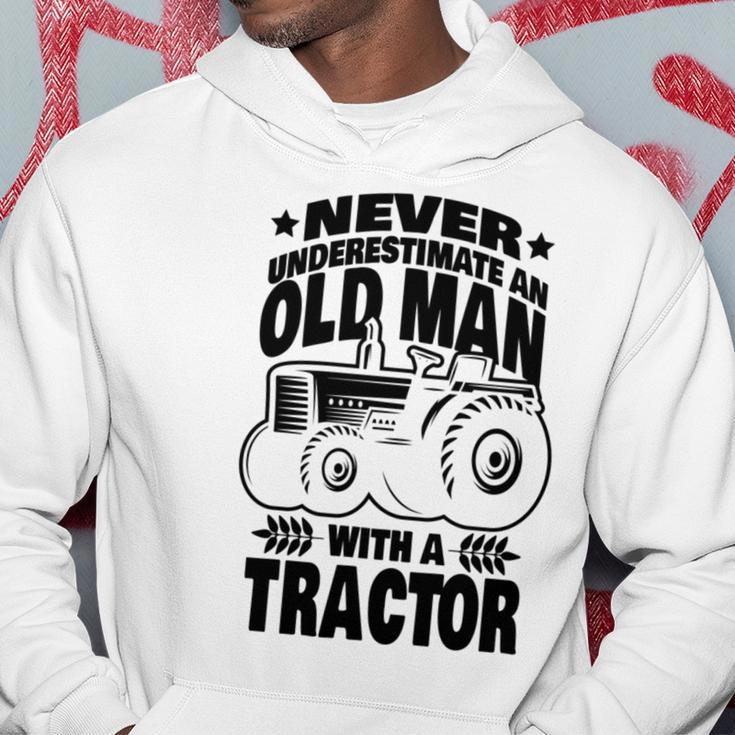 Never Underestimate An Old Man With A Tractor Farmer Dad Hoodie Funny Gifts