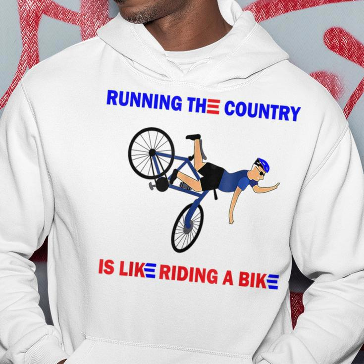 Running The Country Is Like Riding A Bike Funny Biden Fall Running Funny Gifts Hoodie Unique Gifts