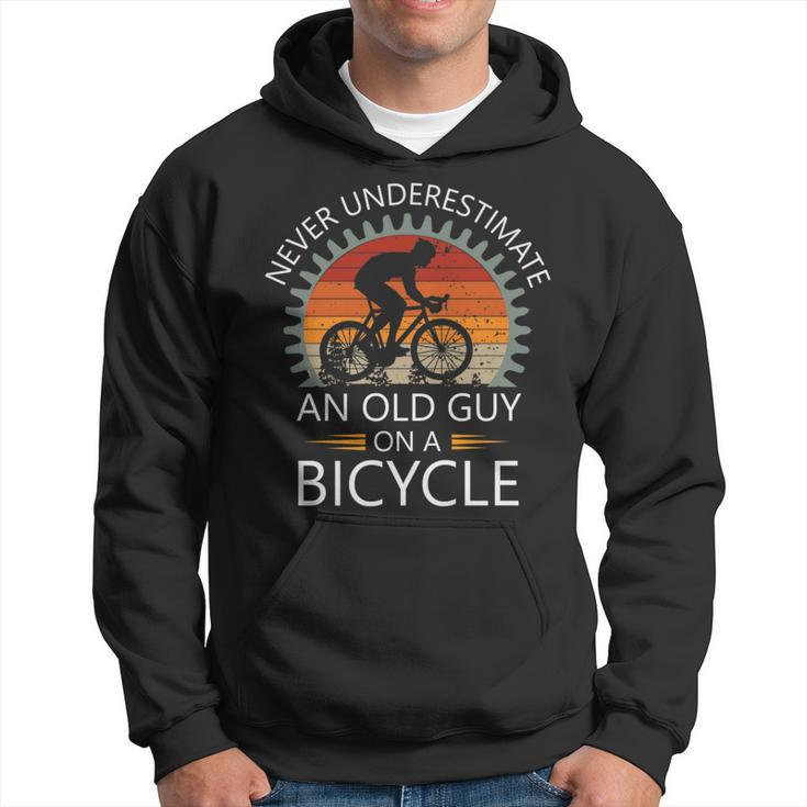 An Old Guy On A Bicycle Cycling Vintage Never Underestimate Cycling Funny Gifts Hoodie