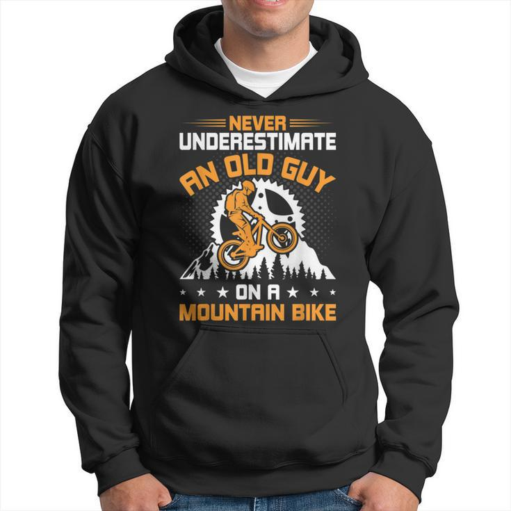 Never Underestimate An Old Guy On Mountain Bike Cycling Gift Cycling Funny Gifts Hoodie
