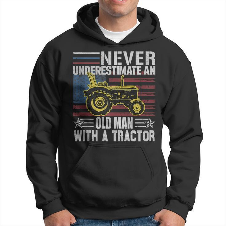 Never Underestimate An Old Man With A Tractor Funny Farming Hoodie