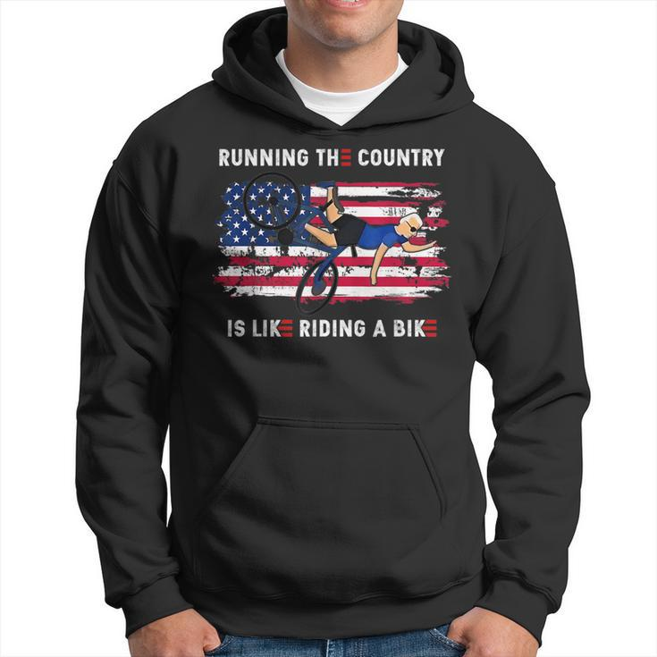 Running The Country Is Like Riding A Bike Funny Joe Biden Running Funny Gifts Hoodie