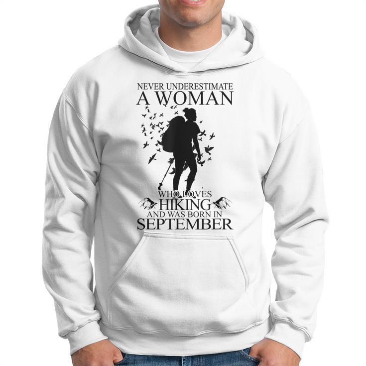Never Underestimate A Woman Who Loves Hiking September Hoodie