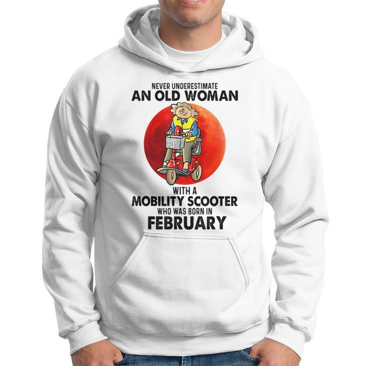 Never Underestimate An Old Woman Mobility Scooter February Old Woman Funny Gifts Hoodie