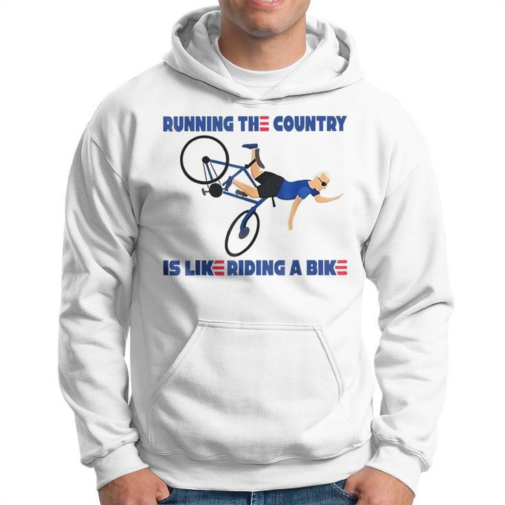 Running The Country Is Like Riding A Bike Funny Biden Running Funny Gifts Hoodie