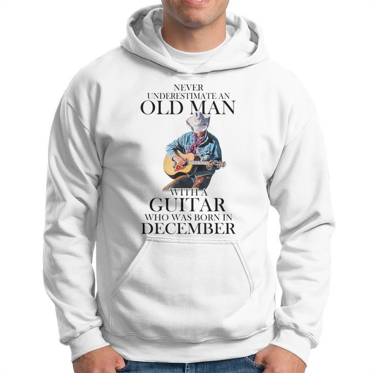 Never Underestimate A December Man With A Guitar Hoodie