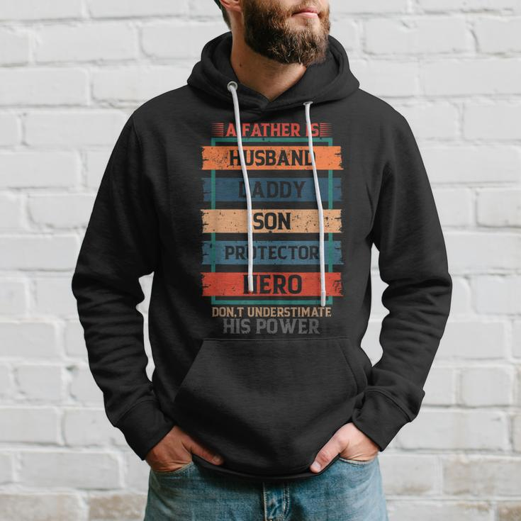 A Father Is Husband Daddy Son Protector Hero Fathers Day Hoodie Gifts for Him