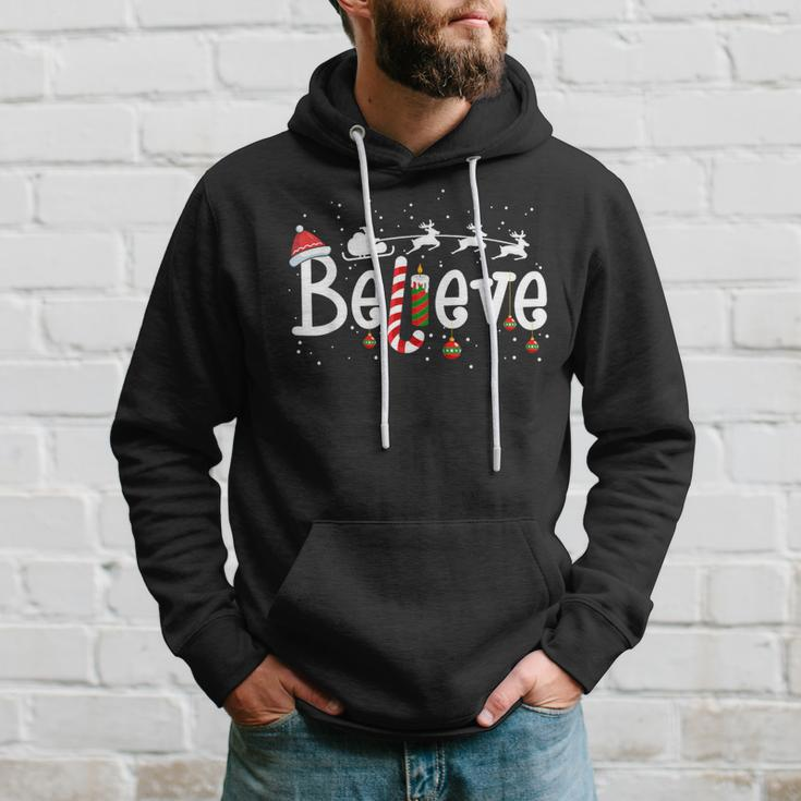Believe Christmas Santa Claus Reindeer Candy Cane Xmas Hoodie Gifts for Him