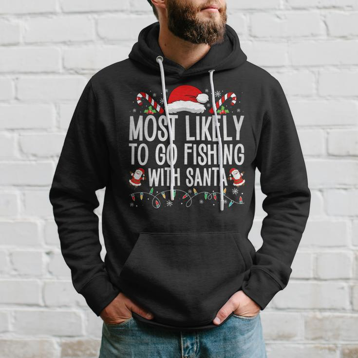 Most Likely To Go Fishing With Santa Fishing Lover Christmas Hoodie Gifts for Him