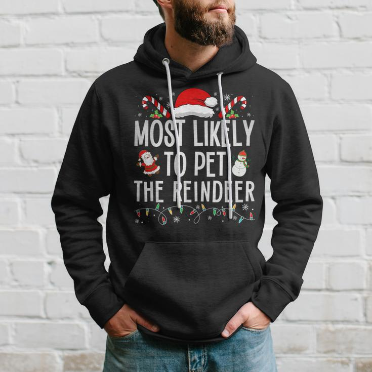 Most Likely To Pet The Reindeer Matching Christmas Hoodie Gifts for Him