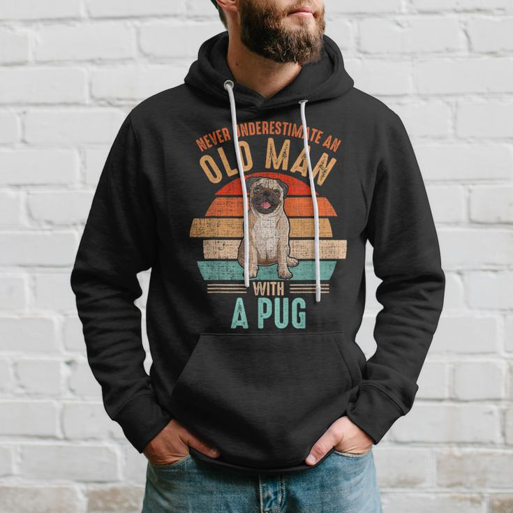 Mb Never Underestimate An Old Man With A Pug Hoodie Gifts for Him