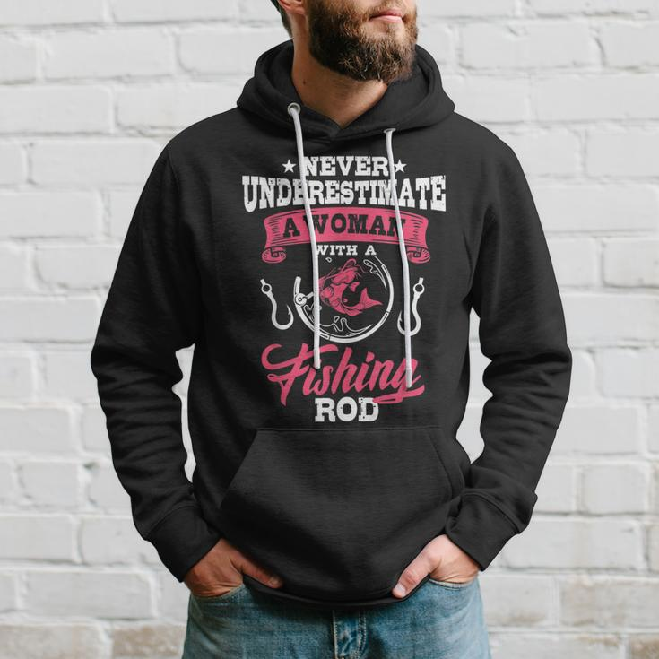 Never Underestimate A Woman With A Fishing Rod Funny Fishing Fishing Rod Funny Gifts Hoodie Gifts for Him