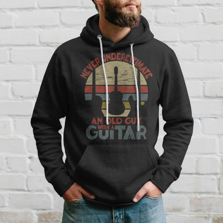 Never Underestimate An Old Guy With A Guitar Funny Guitar Gift For Mens Hoodie Gifts for Him