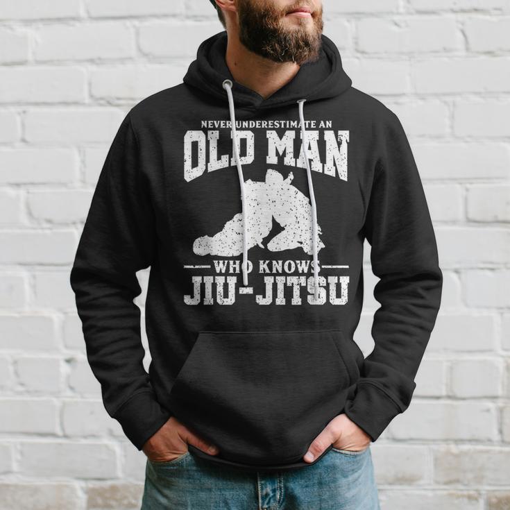 Never Underestimate An Old Man Jiu Jitsu Hoodie Seseable UK