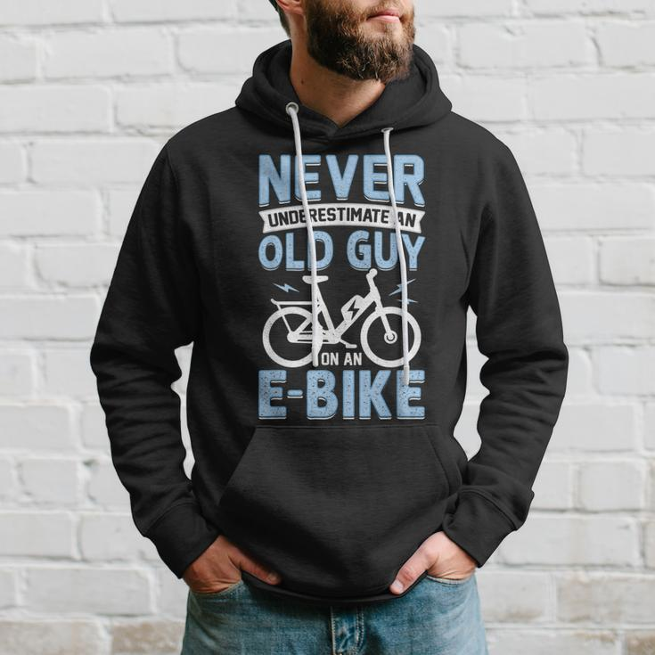 Never Underestimate An Old Man On An Ebike Electric Biking Hoodie Gifts for Him