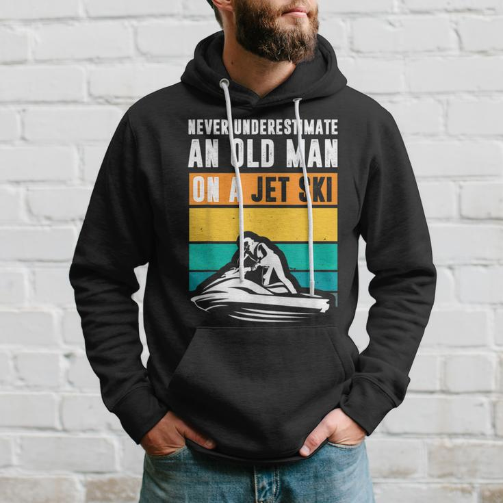 Never Underestimate An Old Man Water Sport Funny Jet Ski Old Man Funny Gifts Hoodie Gifts for Him