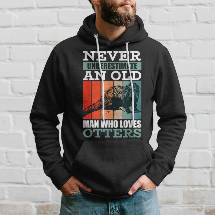 Never Underestimate An Old Man Who Loves Otters With A Otter Hoodie Gifts for Him