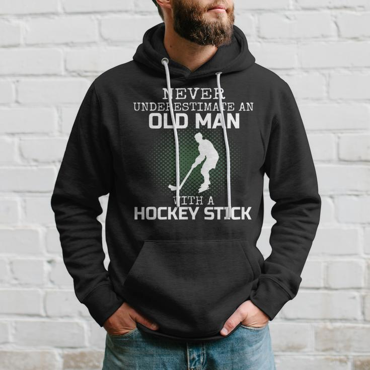 Never Underestimate An Old Man With A Hockey Stick Mens Dad Hoodie Gifts for Him