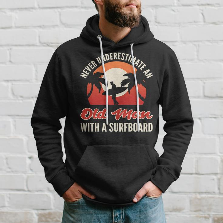 Never Underestimate An Old Man With A Surfboard Surfer Hoodie Gifts for Him