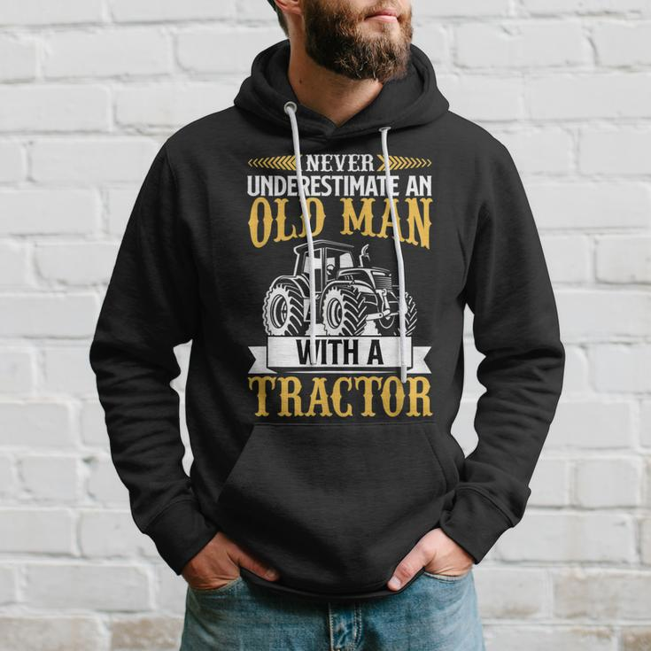 Never Underestimate An Old Man With A Tractor Funny Farmer Hoodie Gifts for Him