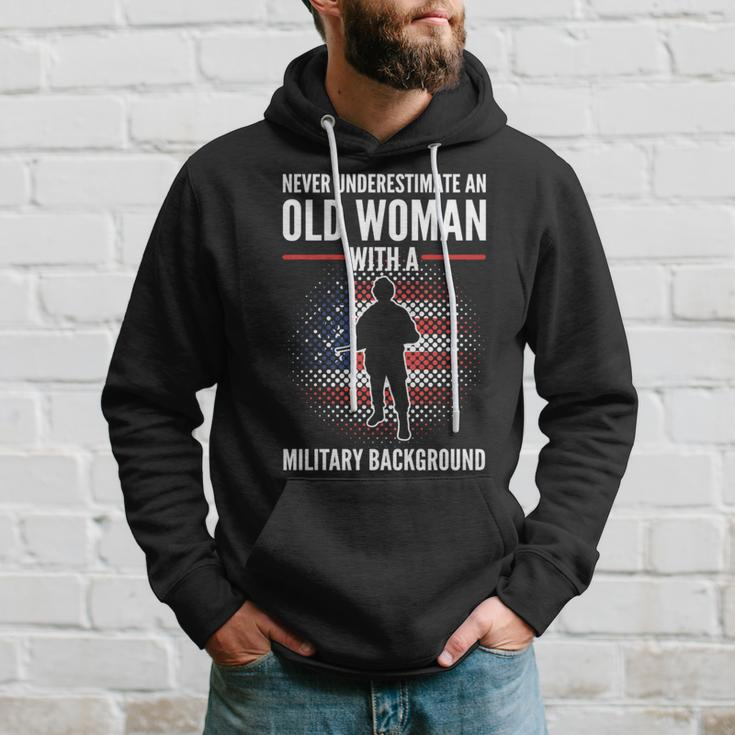 Never Underestimate An Old Woman With A Military Background Hoodie Gifts for Him