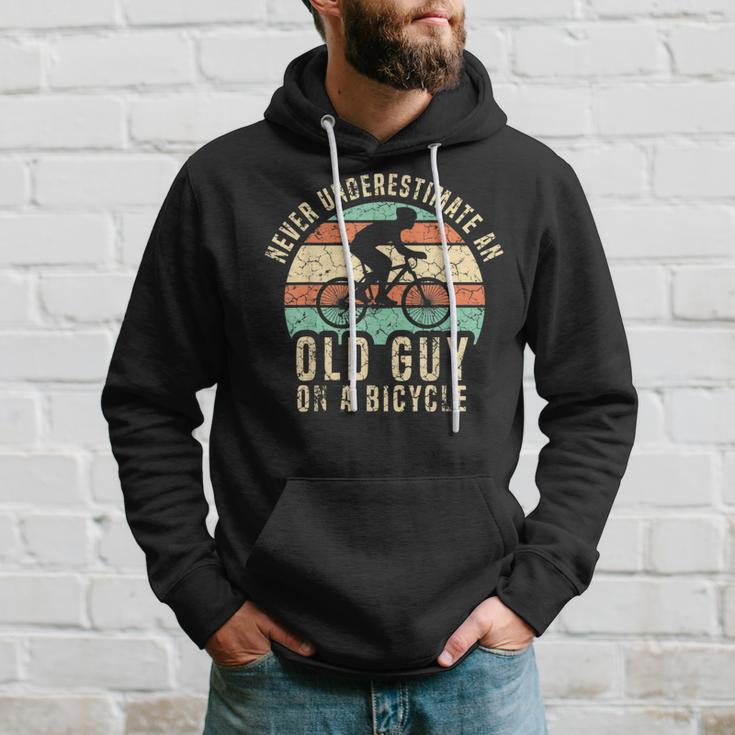 Never Underestimate Funny Cycling Gift For Mens Cycling Funny Gifts Hoodie Gifts for Him