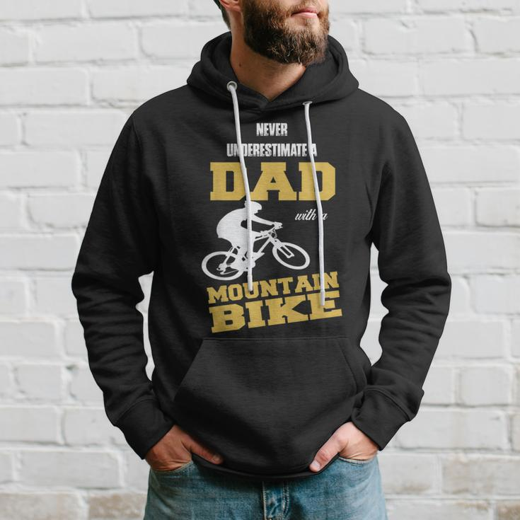 Never Underestimate A Dad With A Mountain BikeHoodie Gifts for Him
