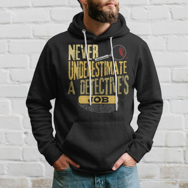 Never Underestimate A Detective's Job Hoodie Gifts for Him