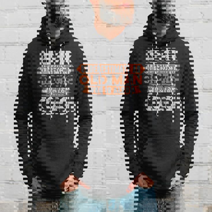 Never Underestimate An Old Man Who Is Also A Coach Hoodie Seseable UK
