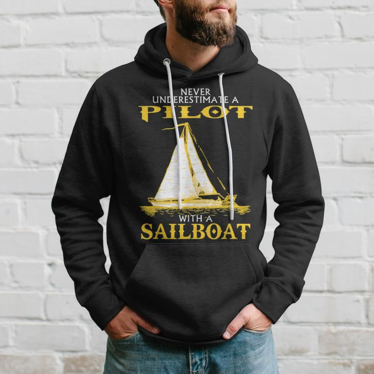 Never Underestimate Sailboat Pilot Hoodie Gifts for Him