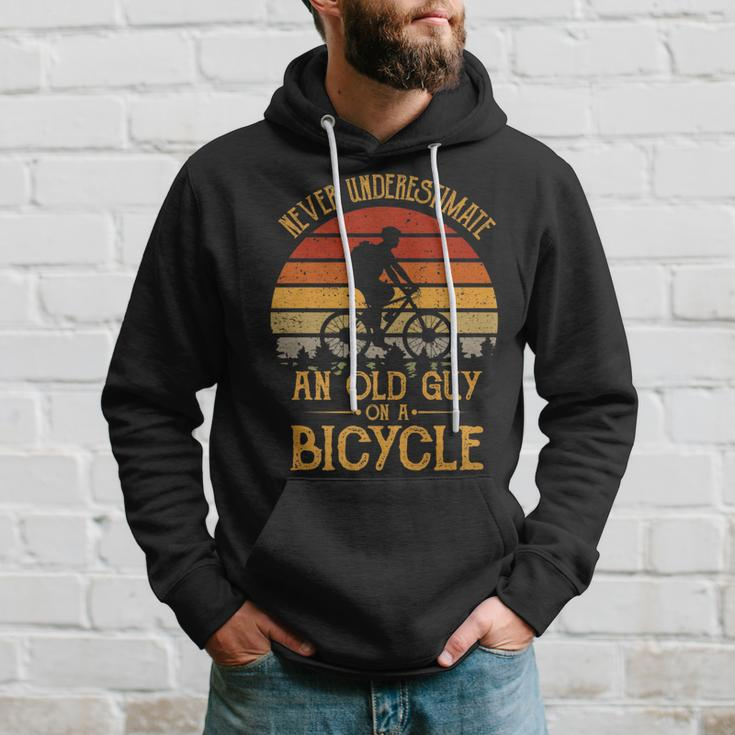 Vintage Never Underestimate An Old Guy On A Bicycle Cycling Gift For Mens Hoodie Gifts for Him