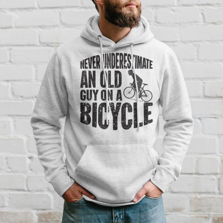 Funny Cycling Never Underestimate An Old Guy On A Bicycle Cycling Funny Gifts Hoodie Gifts for Him
