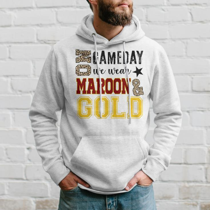 On Gameday Football We Wear Maroon And Gold Leopard Print Hoodie Gifts for Him