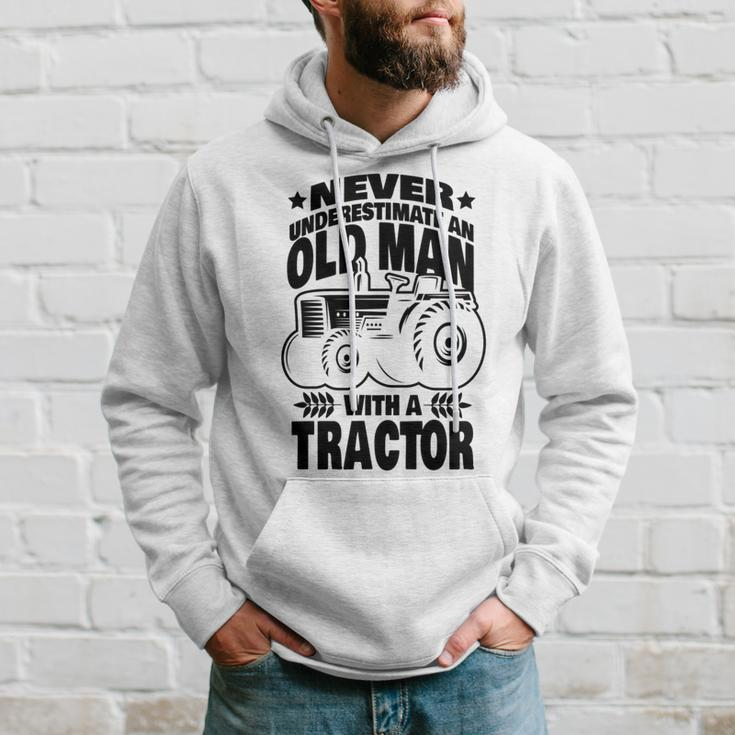 Never Underestimate An Old Man With A Tractor Farmer Dad Hoodie Gifts for Him
