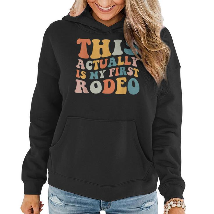 Groovy This Actually Is My First Rodeo Funny Cowboy Cowgirl  Rodeo Funny Gifts Women Hoodie