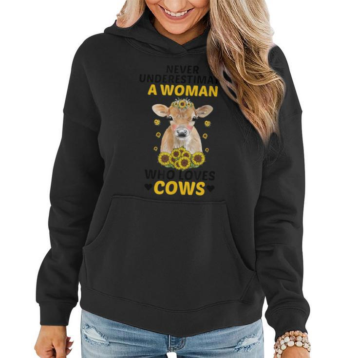 Never Underestimate A Woman Who Loves Cows Farming Lover Women Hoodie