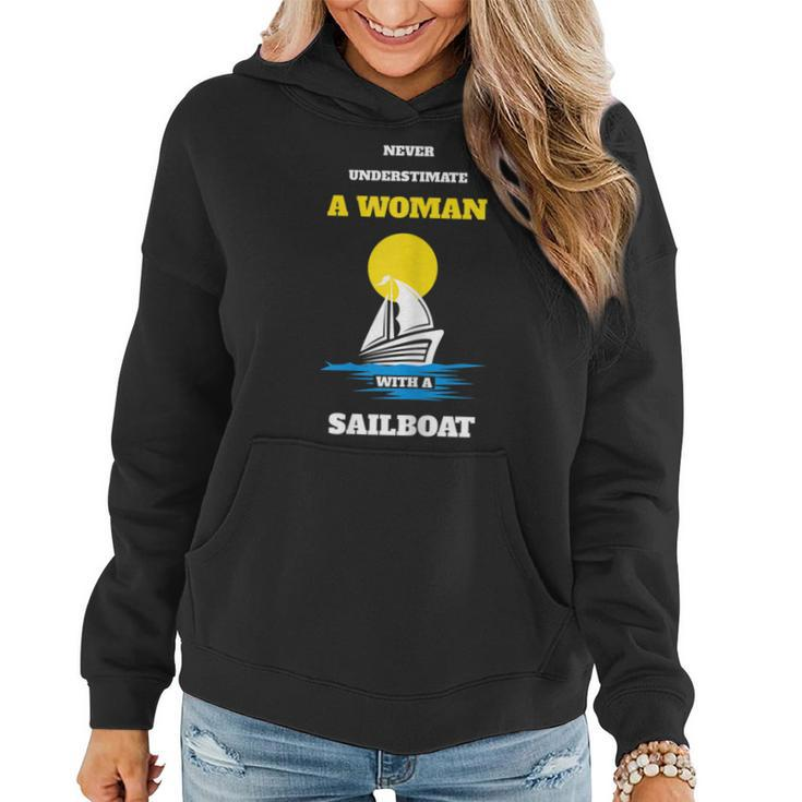 Never Underestimate A Woman With A Sailboat Boating Women Hoodie