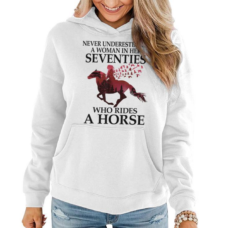 Never Underestimate A Woman In Her Seventies Rides A Horse Women Hoodie