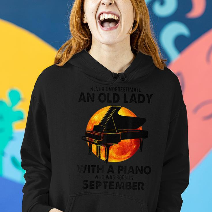 Never Underestimate An Old Lady With A Piano Born September Women Hoodie Gifts for Her