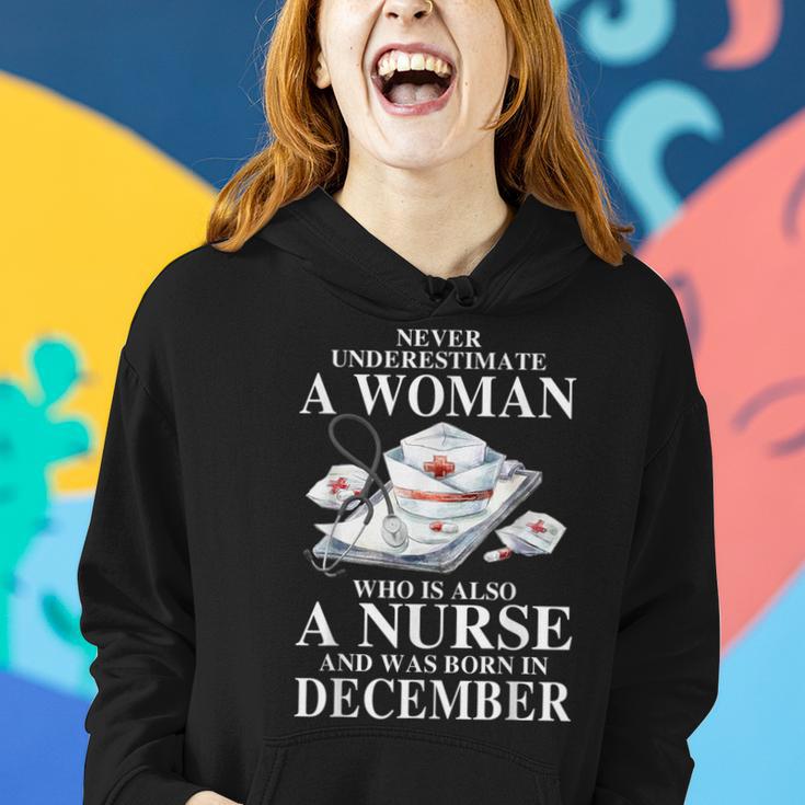 Never Underestimate A Woman Who Is Also A Nurse December Women Hoodie Gifts for Her Never Underestimate A Woman Who Is Also A Nurse December Women Hoodie Gifts for Her