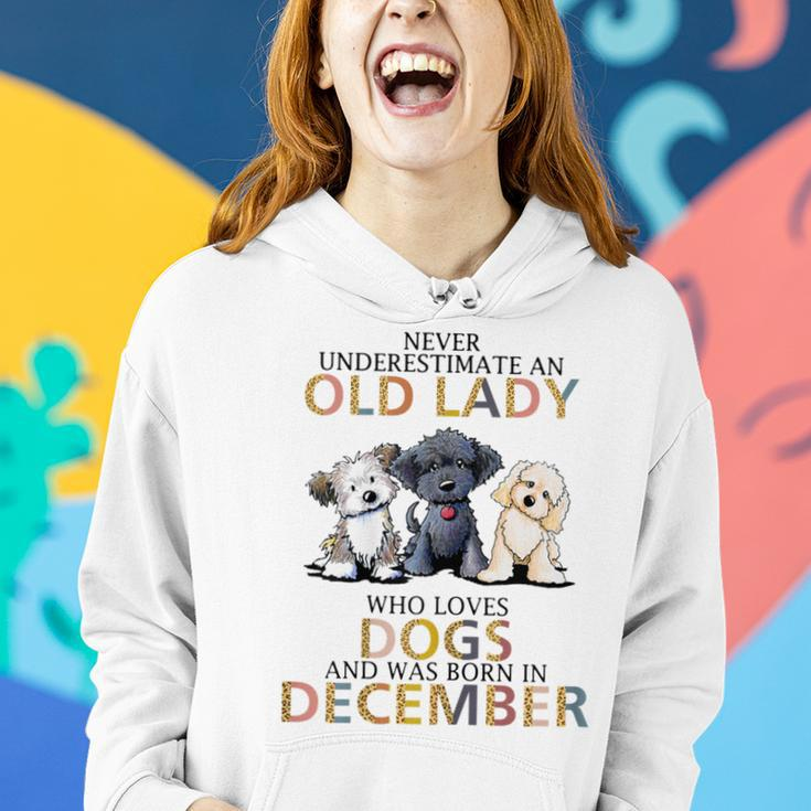 Never Underestimate Old Lady Loves Dogs Born In December Women Hoodie Gifts for Her