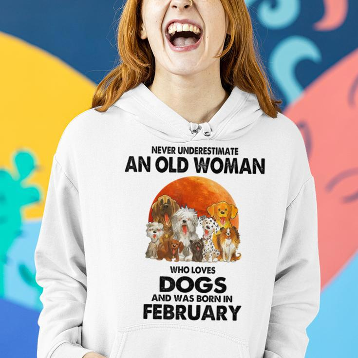 Never Underestimate An Old Woman Who Loves Dogs February Women Hoodie Gifts for Her