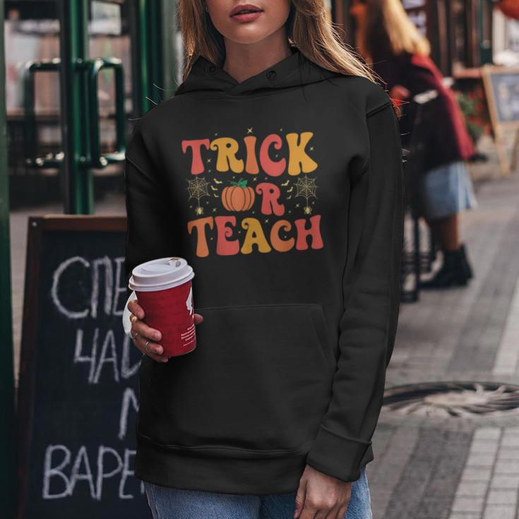 Groovy Trick Or Teach Halloween Teacher Life Girl Women Hoodie Unique Gifts