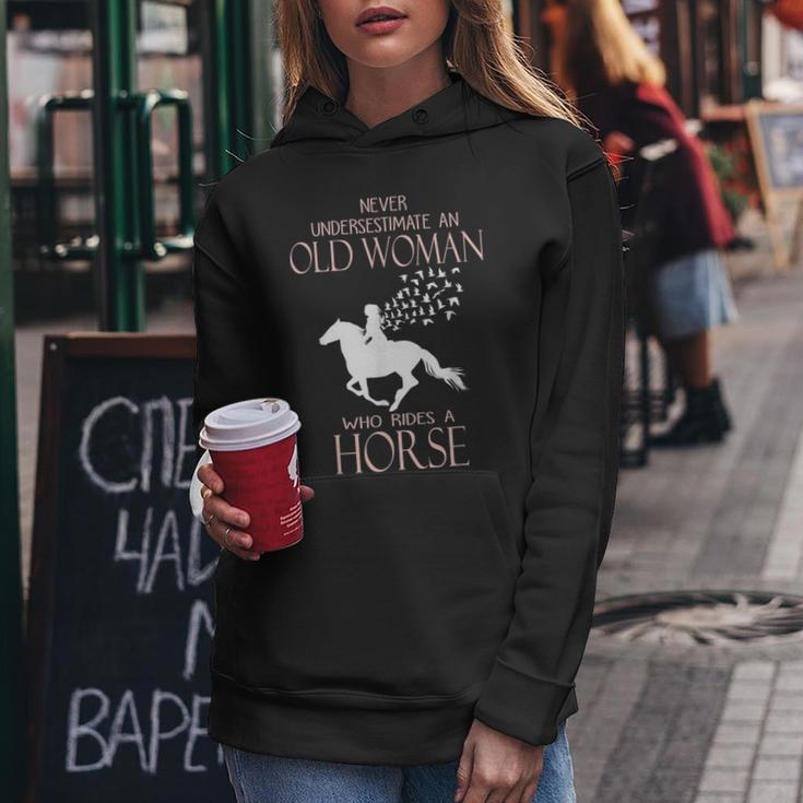 Never Underestimate An Old Woman Who Rides A Horse Old Woman Funny Gifts Women Hoodie Unique Gifts