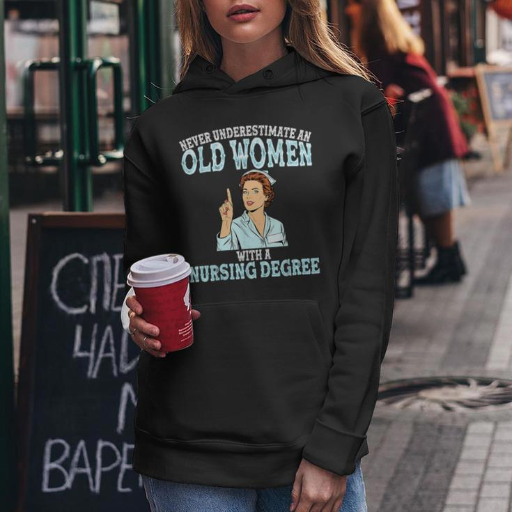 Never Underestimate An Old Woman With A Nursing Degree Nurse Old Woman Funny Gifts Women Hoodie Unique Gifts