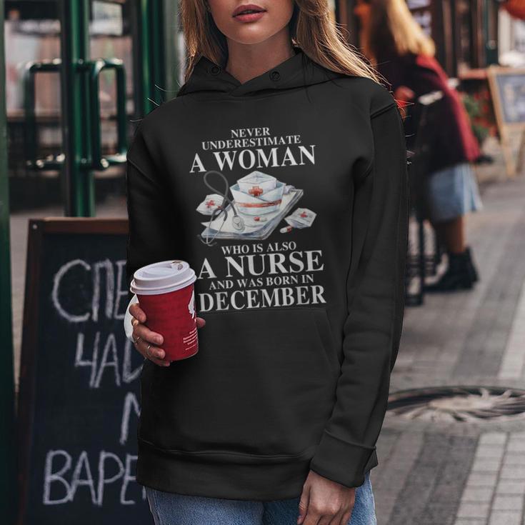Never Underestimate A Woman Who Is Also A Nurse December Women Hoodie Unique Gifts Never Underestimate A Woman Who Is Also A Nurse December Women Hoodie Unique Gifts