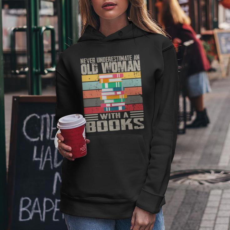 Vintage Never Underestimate An Old Woman With Books Lovers Women Hoodie Unique Gifts