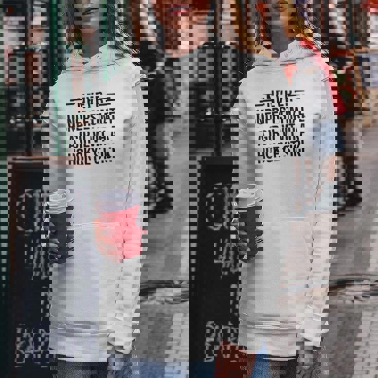 Never Underestimate A Girl With A Hockey Stick Hockey Funny Gift For