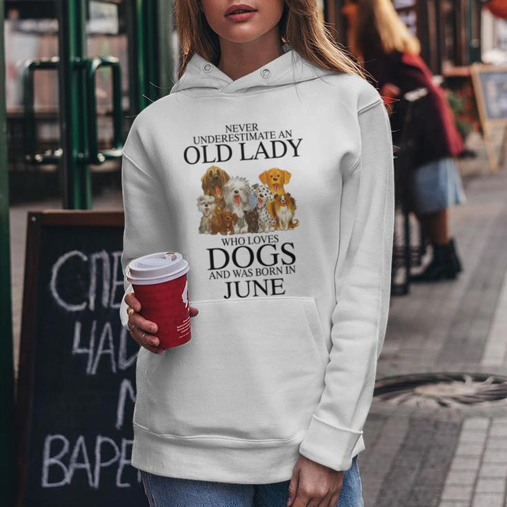 Never Underestimate An Old Lady Who Loves Dogs Born June Women Hoodie Funny Gifts