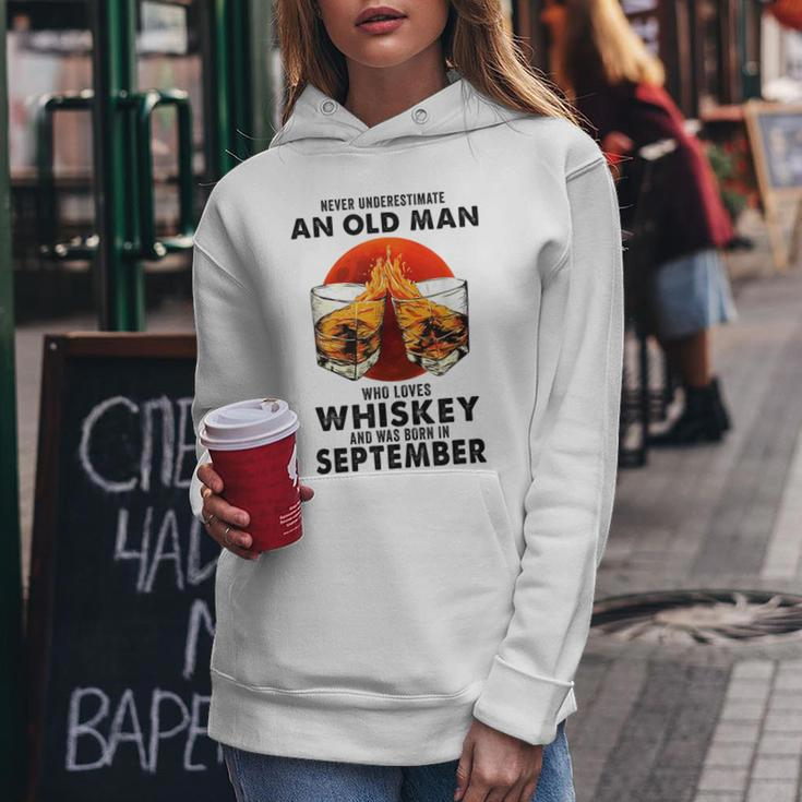 Never Underestimate An Old Man Who Loves Whiskey September Old Man Funny Gifts Women Hoodie Unique Gifts